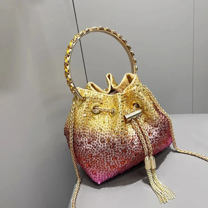 Gold crystal bag with top handle and chain