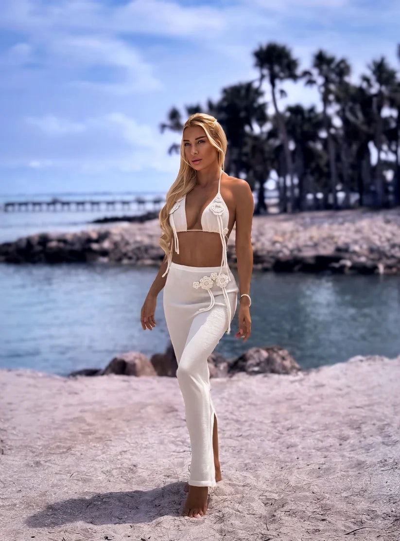 White resortwear set with floral appliqués