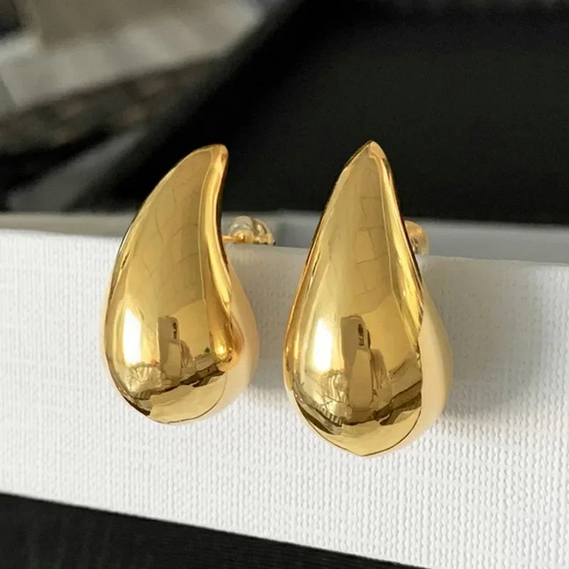 Modern Gold and Silver Stud Earrings with Organic Shape