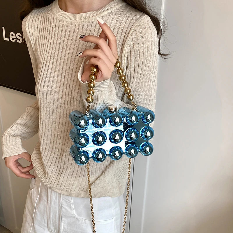 Holographic bubble clutch bag for night outs