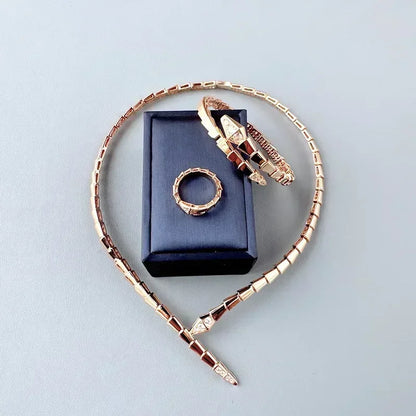 Gold Serpent Jewelry Set with Necklace, Bracelet, and Ring