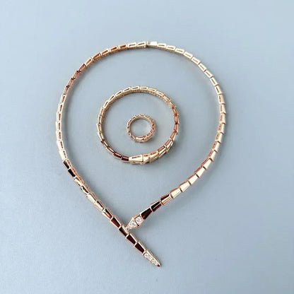 Snake-Inspired Gold Necklace and Bracelet with Crystals