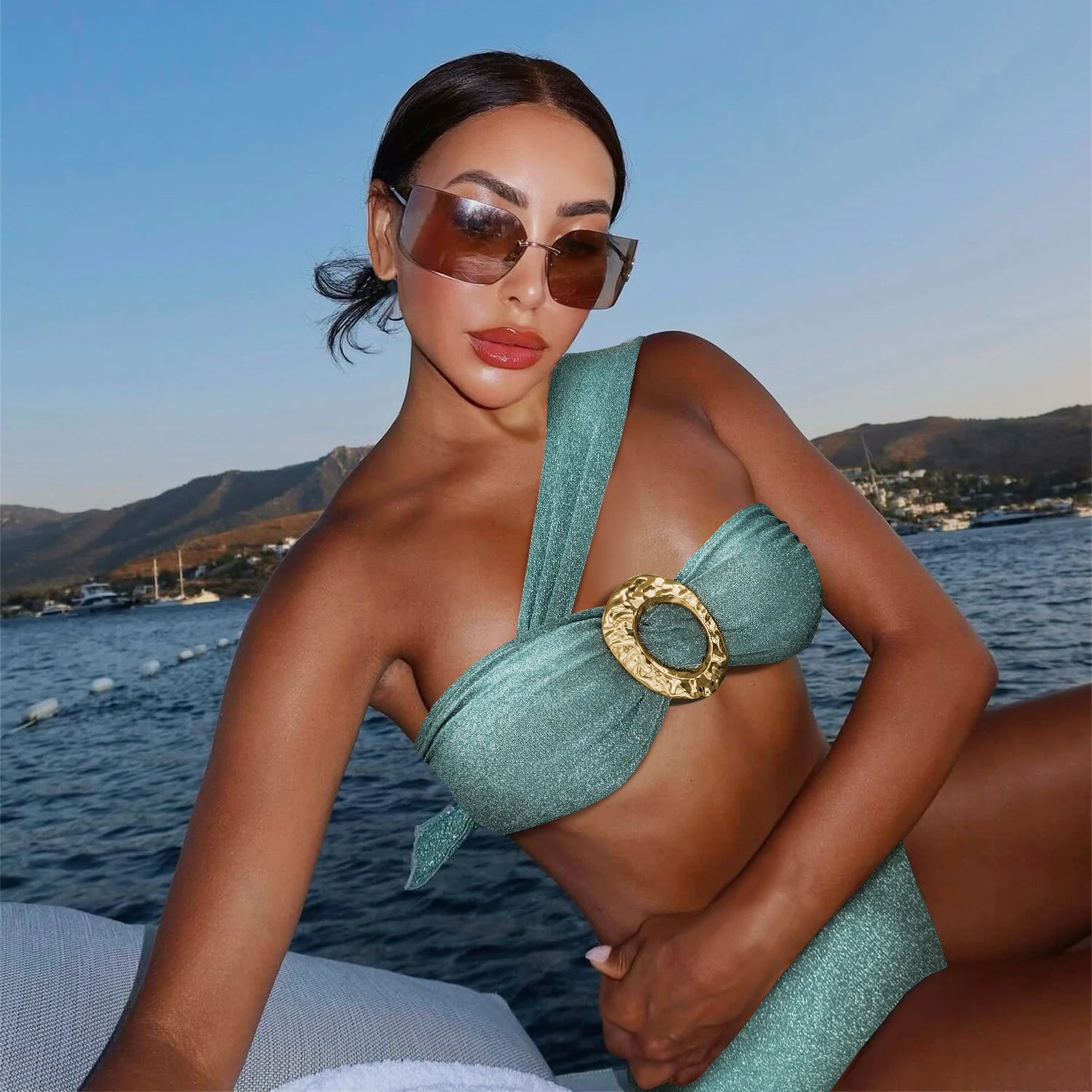 Asymmetrical bandeau bikini with gold buckle